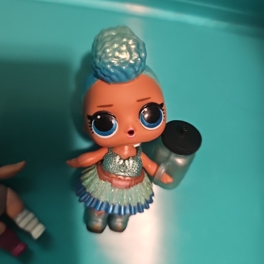 Blue and Green Doll with Bottle